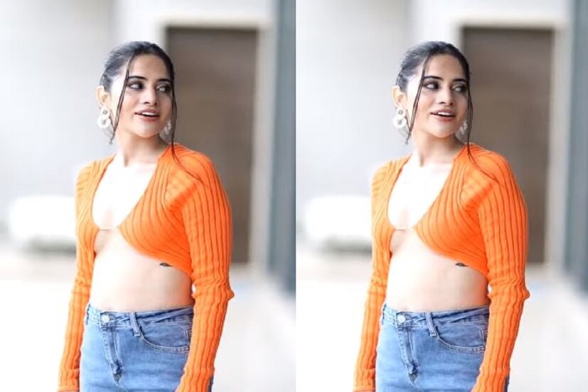 উর্ফি জাভেদের এক একরটি স্টাইলে রীতিমত ঘায়েল হয়েছেন ভক্তরা ৷ উর্ফি জাভেদের কমলা রঙের টপের একটি ভিডিও সোশ্যাল মিডিয়ায় ভাইরাল হয়েছে ৷ ছবি সৌজন্যে ইনস্টাগ্রাম ৷