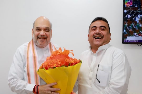 Amit Shah asks Suvendu Adhikary to work as one team in bengal