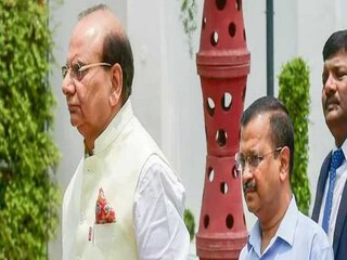 Delhi LG VK Saxena with CM Arvind Kejriwal