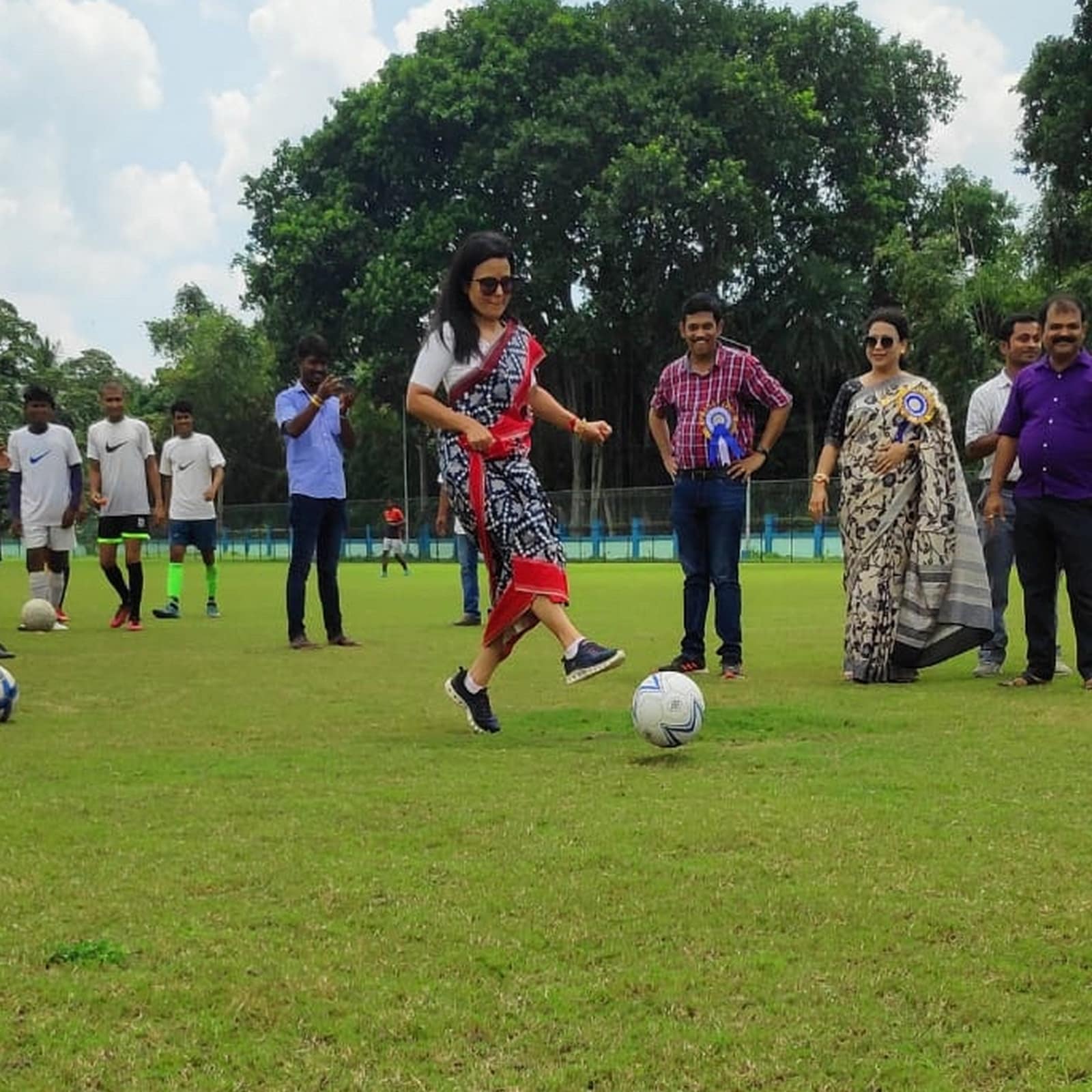 Mahua Moitra DRIBBLING with a football, holding her SAREE in one