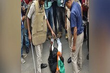 হাতে ধরা জাতীয় পতাকা,চাকরিপ্রার্থীকে রাস্তায় ফেলে মার সরকারি আমলার, ভাইরাল ভিডিও