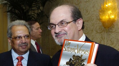 Salman Rushdie with The Satanic Verses Salman Rushdie with The Satanic Verses