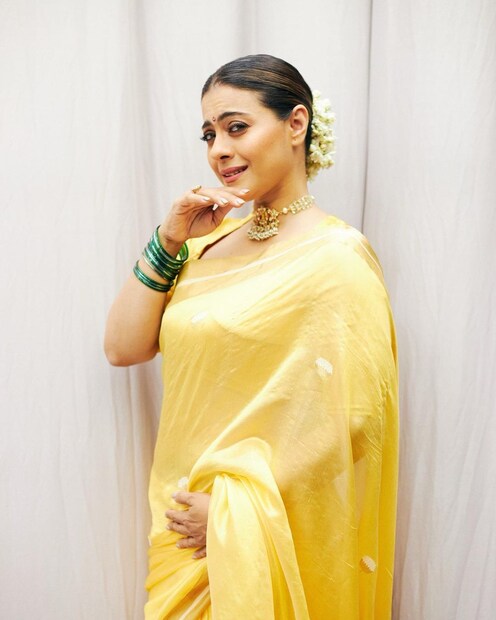 কাজল পরেছেন হলুদ হ্যান্ডলুমের শাড়ি। 