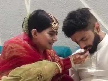 বিয়ে মিটতেই ক্লান্তিতে এলিয়ে পড়লেন বর; পরম যত্নে খাইয়ে দিলেন নববধূ! মিষ্টি ভিডিওয় মন মজেছে নেটিজেনদের