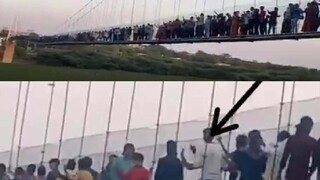 গুজরাতে ৪০০ মানুষ নিয়ে ভেঙে পড়ল ব্রিজ গুজরাতে ৪০০ মানুষ নিয়ে ভেঙে পড়ল ব্রিজ