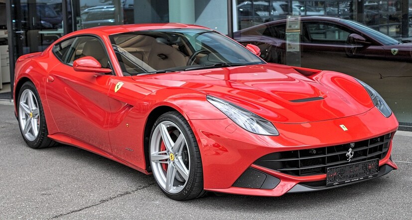 Ferrari F12 Berlinetta এই গাড়িটির দাম ৪ কোটি টাকারও বেশি ৷ এই গাড়িতে ৬.২ লিটারের সুপার চার্ড V12 ইঞ্জিন আছে যা 730.9bhp ও 690Nm জেনারেট করে ৷ এই গাড়ির টপ স্পিড ৩৪০ মাইল প্রতি ঘণ্টায় ৷ প্রতীকী ছবি ৷