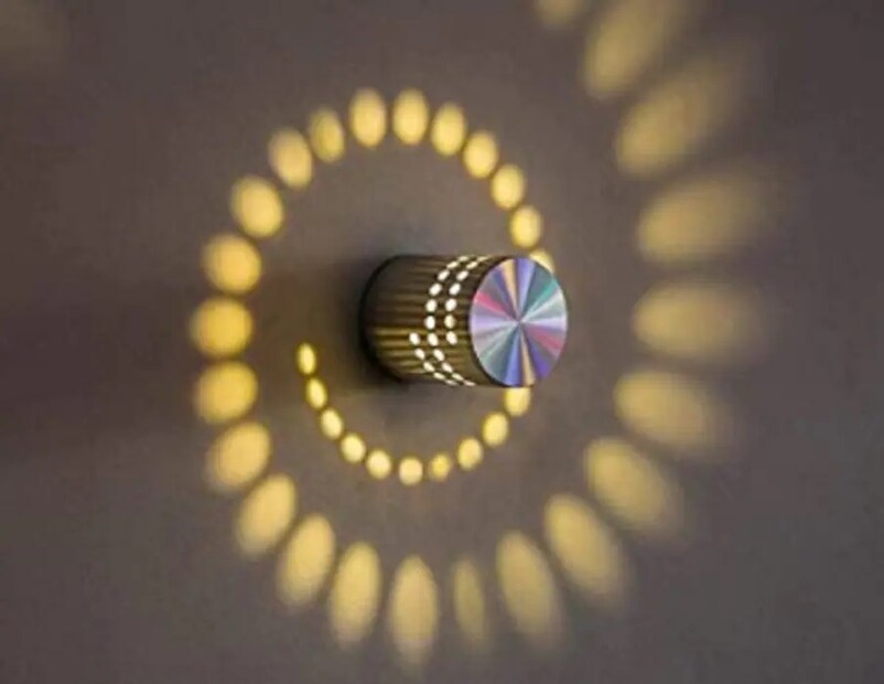 Blissbells LED 5W Interior Wall Light - অ্যামাজনের সেলে এই লাইটটি পাওয়া যাচ্ছে মাত্র ৭৫৯ টাকায়। অ্যামাজনের সেলে এই লাইটের ওপরে পাওয়া যাচ্ছে ২২৪০ টাকার ছাড়। এই লাইটের আসল দাম ২৯৯৯ টাকা। এই লাইটে ব্যবহার করা হয়েছে মেটাল বডি এবং ৩৬০ ডিগ্রি অ্যাডজাস্টেবল এলইডি সারফেস যুক্ত ল্যাম্প। এর ফলে এই লাইট ঘরের ভেতর এবং বাইরে দুটি জায়গাতেই ব্যবহার করা যাবে।