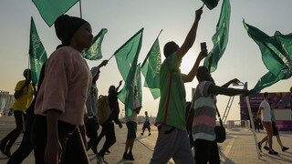 Fans of Saudi Arabia celebrate their team 2-1 victory over Argentina in a World Cup group C soccer match, outside the Lusail Stadium in Lusail Qatar, Tuesday, Nov. 22, 2022. (AP Photo/Andre Penner)