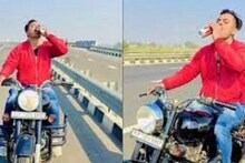 বিয়ারের ক্যান হাতে দিল্লি মিরাট এক্সপ্রেসওয়েতে বাইকার ! সবাই হতবাক