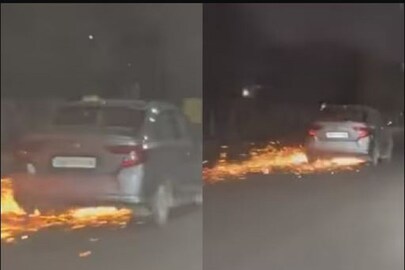 এ ভাবেই গাড়ির নীচ থেকে ছিটকে বেরোল আগুন। 