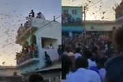 আকাশ থেকে বৃষ্টির মতো ঝরে পড়ছে ৫০০ টাকার নোট! বিশ্বাস না হলে দেখুন ভিডিও