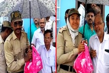 'তারাও মানুষ',  ট্রাফিকের মাথায় ছাতা ধরে মানবিক বার্তা