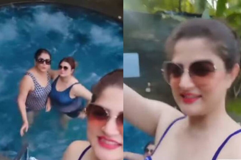 শ্রাবন্তী পরেছেন নীল রঙের বিকিনি। ঠোঁটে গোলাপি লিপস্টিক। চোখে রোদ চশমা। কোনও চেষ্টা ছাড়াই অবলীলায় পারদ চড়িয়েছেন শ্রাবন্তী।