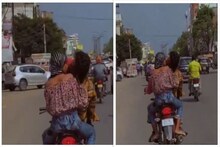 চলন্ত বাইকে ঠোঁটে ঠোঁট চেপে গভীর চুমু যুবক-যুবতীর! দিনের আলোয় উত্তাল প্রেম!