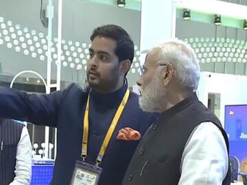 Akash Ambani, Chairman, Reliance Jio Infocomm Limited, showcasing Jio’s indigenous technology & products including JioSpaceFiber to the Honorable Prime Minister of India Narendra Modi at the Jio pavilion at India Mobile Congress on Friday