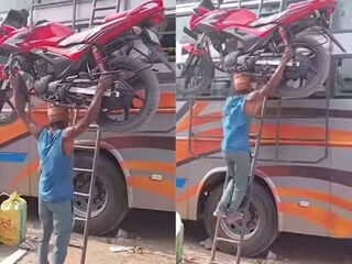 একহাতে বাইক তুলে অবলীলায় ভাঙছেন সিঁড়ি