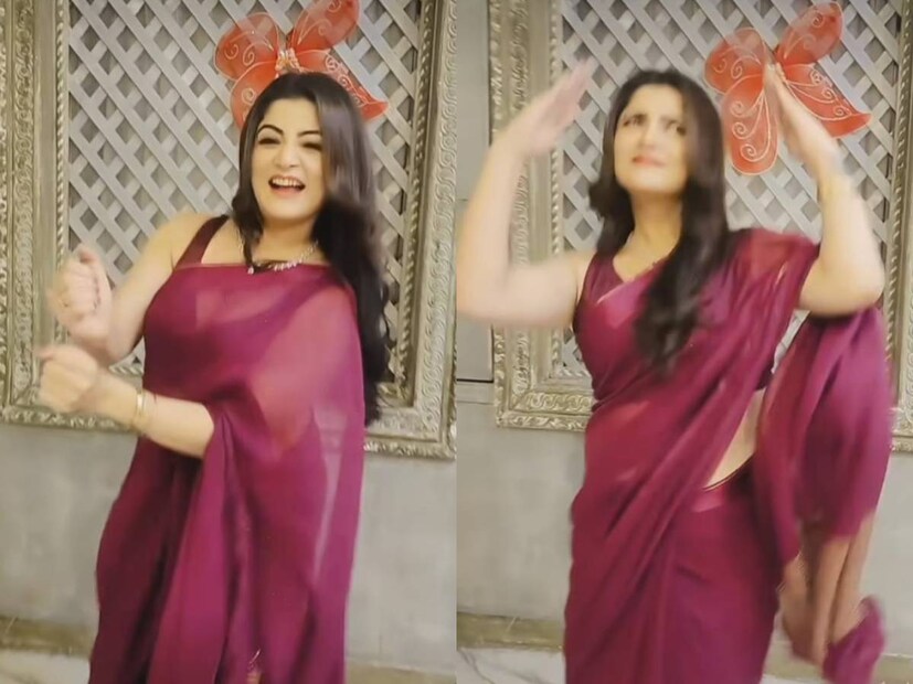 ম্যাজেন্টা রংয়ের সিল্কের শাড়ি। খোলা চুল, হালকা মেক আপ। মুখে হাসি। শ্রাবন্তী চট্টোপাধ্যায়ের থেকে যেন চোখ ফেরানো দায়।