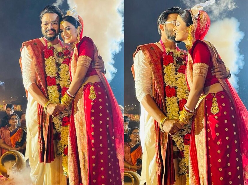 কপালে চন্দন, লাল টিপ বিশেষ দিনে বাঙালি কনের সাজে সেজে উঠেছিলেন অভিনেত্রী। রুপোর কাজ করা লাল বেনারসি ছিল দর্শনার পরনে। সঙ্গে গা-ভর্তি সোনার গয়না। অন্যদিকে, সাদা পাঞ্জাবি সঙ্গে ম্যাচিং করে লাল শালে তাক লাগিয়েছেন সৌরভও। 