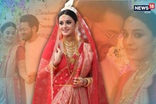 রুপো বসানো লাল শাড়িতে দর্শনা, ধরা দিলেন সৌরভের বাহুডোরে... নবদম্পতির প্রথম ছবি