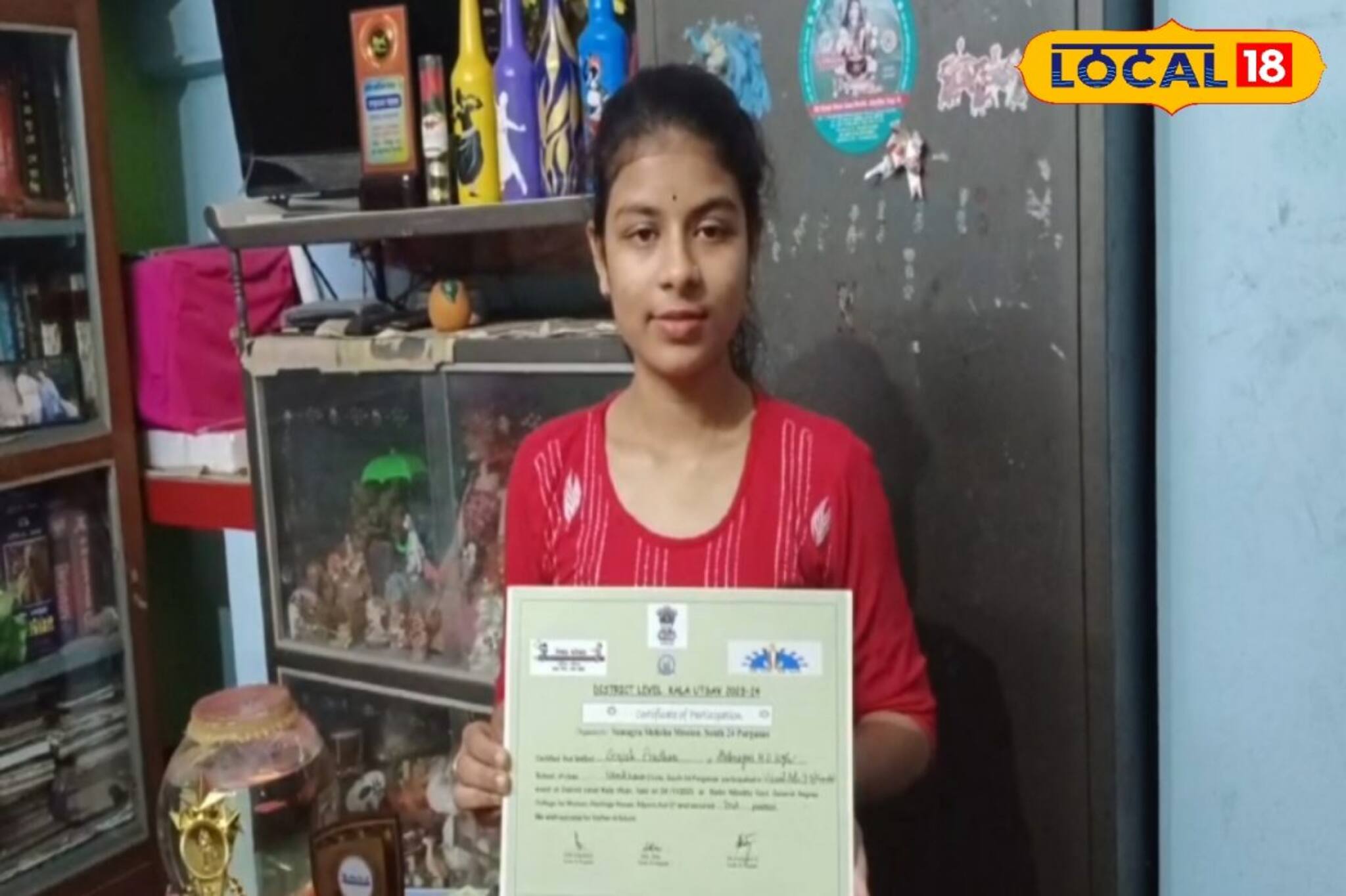 স্বাস্থ্য সম্পর্কিত পোস্টার ডিজাইন করে রাজ্যের মধ্যে প্রথম নামখানার সেঁজুতি