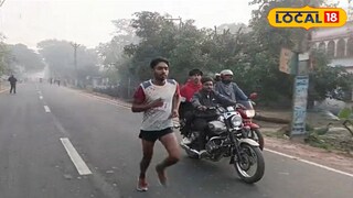 রাস্তায় দৌড় ম্যারাথন অংশগ্রহণকারীর