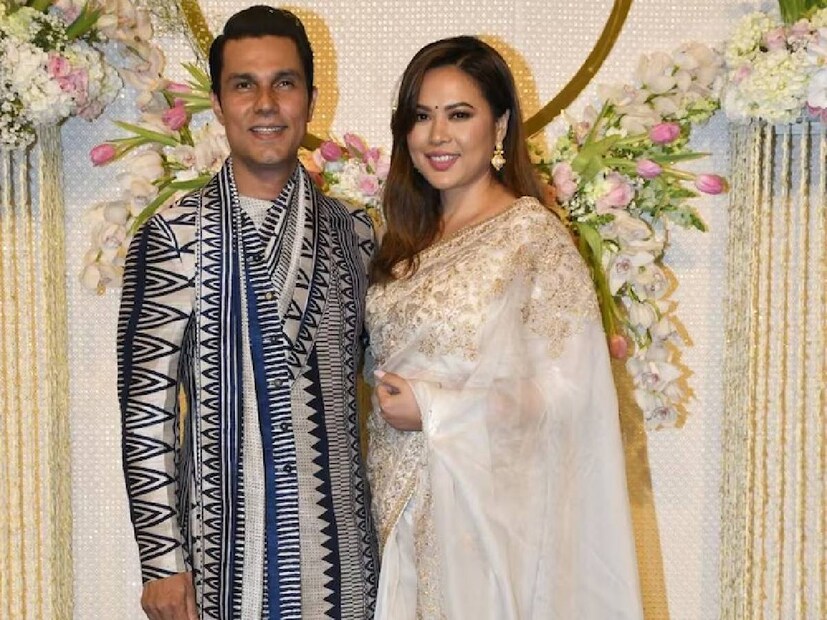 ইরার বিয়েতে দেখা দিলেন অভিনেতা রণদীপ হুডা। সঙ্গে তাঁর নববধূ লিন।