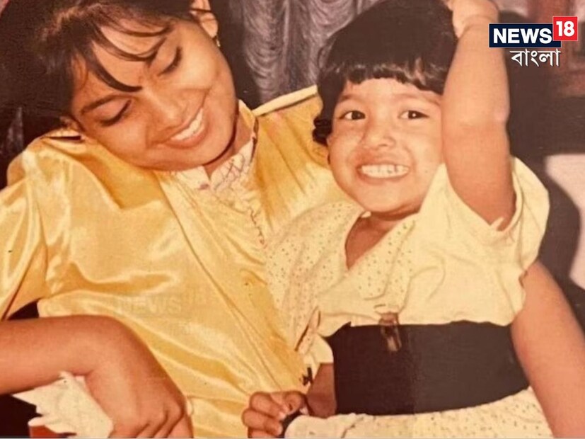 সোনালী জামা মুখে একগাল হাসি। দেখে কি একটু চেনা চেনা লাগছে? কয়েকটি সূত্র ধরিয়ে দেওয়া যাক। (ছবি সৌজন্যে: Instagram: @bipashabasu)