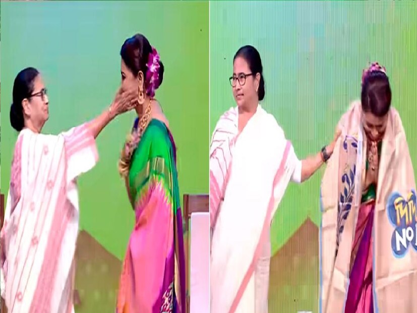 *এ দিন মমতা বন্দ্যোপাধ্যায় পরেছিলেন খয়েরি সরু পাড়ের সাদা শাড়ি। ডোনার পরেছিলেন লাল পাড়ের কালো শাড়ি। সংগৃহীত ছবি। 