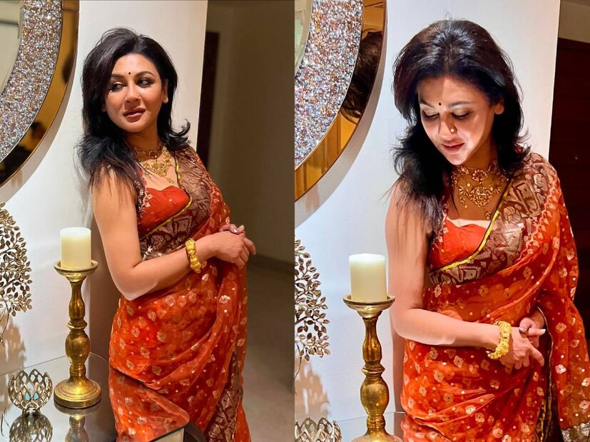 নায়িকার হাতে মাখা পান্তা ভাত চাক্ষুষ করতে কমেন্ট বক্সে ঝাঁপিয়ে পড়েছেন নেটিজেনরা। পরনে ছিল ধানী রঙের জামদানি শাড়ি, তার উপরে সোনালি কারুকাজ। সঙ্গে লাল রঙের হাতাকাটা ব্লাউজ।