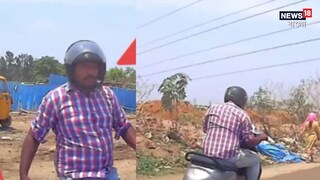 মাঝরাস্তায় গাড়ির উপর হামলা স্কুটার-আরোহী