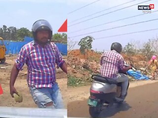 মাঝরাস্তায় গাড়ির উপর হামলা স্কুটার-আরোহী