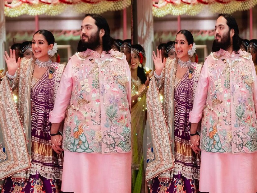 ডান্ডিয়া নাচের আসরে রাধিকা মার্চেন্ট ও অনন্ত আম্বানি। দু’জনের গলায় গোলাপি মালা। হাতে ডান্ডিয়া। অনন্তর পরনে সদা কুর্তা পাজামা। তার ওপর নেহরু জ্যাকেট। রাধিকার পরেছেন চওড়া পাড়ের বেগুনি লেহঙ্গা। দু’জনকেই মানিয়েছে চমৎকার।