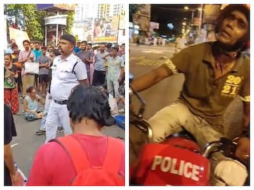 পুলিশ অফিসারকে ঘেরাও করে রেখেছেন বিক্ষোভকারীরা৷ অভিযুক্ত সিভিক ভলেন্টিয়ার (ডানদিকে)৷ 