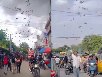 টাকা ওড়ার ছবি