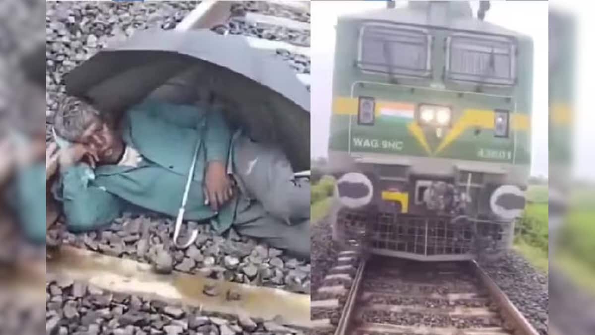 ধেয়ে আসছে ট্রেন, রেললাইনে ছাতা খুলে দিবানিদ্রা, তারপর যা হল! অবাক হবেন