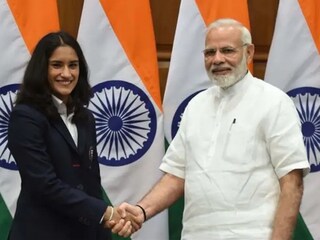 ভিনেশ এবং মোদি