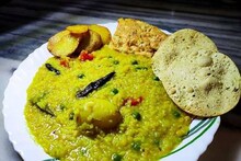 বৃষ্টির দিনে গরম গরম খিচুড়ি হলে জমে যায়! জানেন এই খাবার খেলে আপনার শরীরে কী হয়?