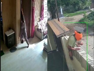পাঁচিল টপকে ঢুকছে চোর, দরজা আটকে মহিলা৷ ছবি- এক্স থেকে