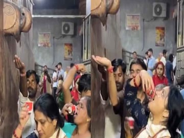 মন্দিরে এসির জল খাচ্ছেন ভক্তরা