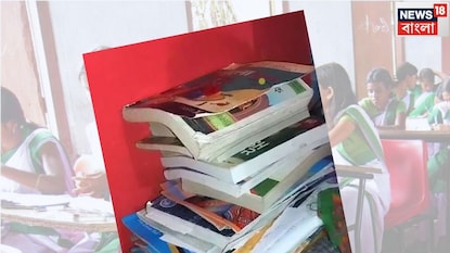 ঘরের টেবিলে রাখা খাতাবই ঘরের টেবিলে রাখা খাতাবই