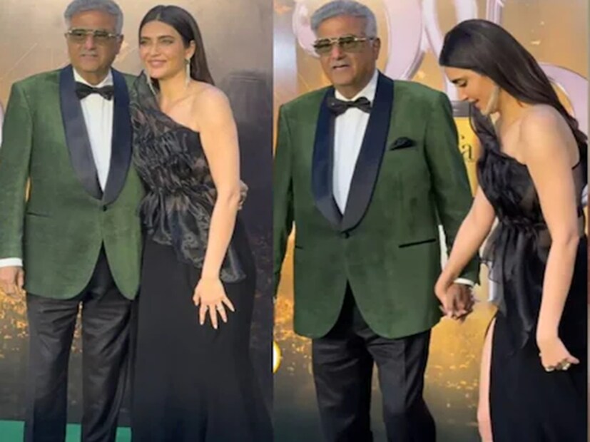 সম্প্রতি IIFA 2025-এর রেড কার্পেটে অভিনেত্রী করিশ্মা তান্নার সঙ্গে সাক্ষাৎ হয়েছিল বলিউডের স্বনামধন্য প্রযোজক বনি কাপুরের। আর সেই ভিডিওটিই ভাইরাল হয়েছে সোশ্যাল মিডিয়ায়। ভাইরাল সেই ক্লিপেই পাপারাৎজিদের জন্য পোজ দিয়ে ছবি তুলতে দেখা গিয়েছে বনি কাপুরকে। আর সেই সময়ই সেখানে প্রবেশ করেন করিশ্মা তান্না। Photo: Instagram