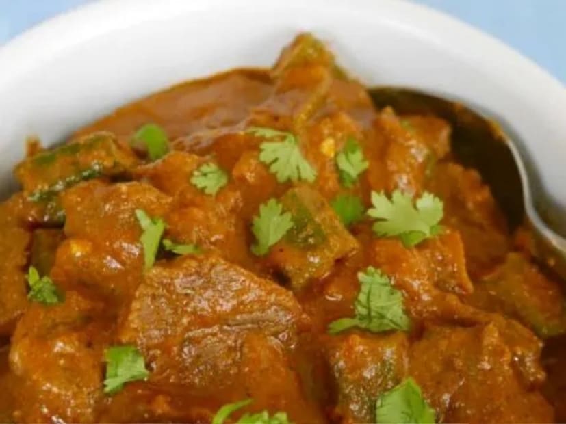 ঢ্যাঁড়স ঢালার পরে গোটা বিষয়টা ১০-১৫ মিনিট আরও ফুটিয়ে নিন৷ একদম শেষে ভাল করে নেড়ে নামিয়ে নিন গ্যাস থেকে৷ তারপর কাঁচা লঙ্কা চিরে আর ধনে পাতা দিয়ে গার্নিশ করে নামিয়ে ফেলুন৷ গরম গরম পরিবেশন করুন ভাত বা রুটির সঙ্গে৷
