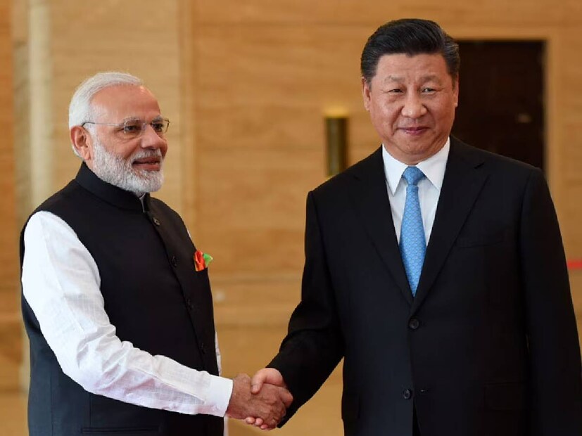 ভারত চিনের তিক্ত সম্পর্ক নিয়ে বহু আলোচনা হলেও খানিকটা মার্কিন বাণিজ্য নীতির ফলে বন্ধুত্ব স্থাপন করছে ভারত এবং চিন। Image: AFP