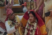 মাথা ঢাকা লাল লজ্জাবস্ত্রে, দিলীপ ঘোষ রাঙিয়ে দিলেন নববধূর সিঁথি, কী দিয়ে হল সিঁদুর দান