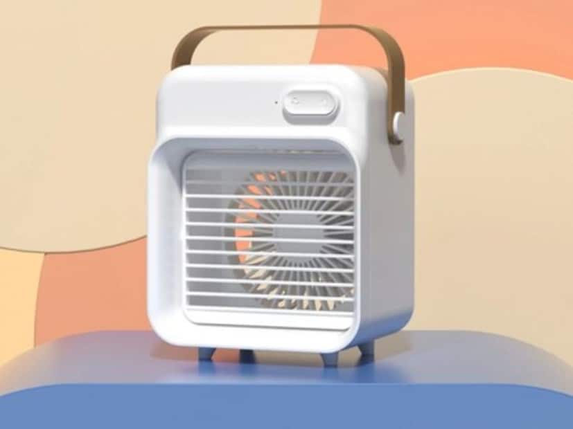 Amazon-এ আরও মিনি AC: Creodec মিনি কুলারও একই ধরনের একটি মিনি পোর্টেবল এসি। এর হাইড্রো চিল টেকনোলজি এয়ারকুলিং ফিল্টারের মাধ্যমে বাইরের গরম হাওয়া টেনে নিয়ে ঠান্ডা হাওয়ায় বদলে দেয়। Amazon-এ এর দাম ২,৪৯৯ টাকা। একবার জল ভরে এটি পুরো ৮ ঘণ্টা পর্যন্ত চালানো যেতে পারে। Representative Image