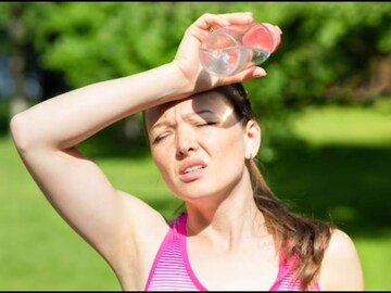 চড়চড় করে উঠছে পারদ; তাপপ্রবাহের হাত থেকে নিজেকে বাঁচাবেন কীভাবে? পরামর্শ দিচ্ছেন চিকিৎসক