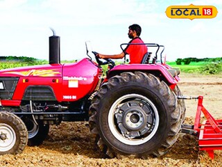 ট্রাক্টর দিয়ে জমি চাষ