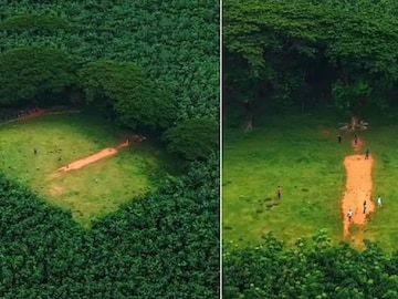 Kerala Viral Cricket Ground: ঘন জঙ্গলের মাঝে ক্রিকেট মাঠ! ভাইরাল ছবি দেখেছেন? ভারতের আশ্চর্য জায়গা! Kerala Viral Cricket Ground: ঘন জঙ্গলের মাঝে ক্রিকেট মাঠ! ভাইরাল ছবি দেখেছেন? ভারতের আশ্চর্য জায়গা!