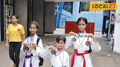 তিন পদকজয়ী তিন পদকজয়ী