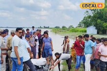 বিরল দৃশ্য! বন্যা কবলিত এলাকায় নৌকায় চেপে ত্রাণ বিলি খোদ রাজ্যের মন্ত্রীর